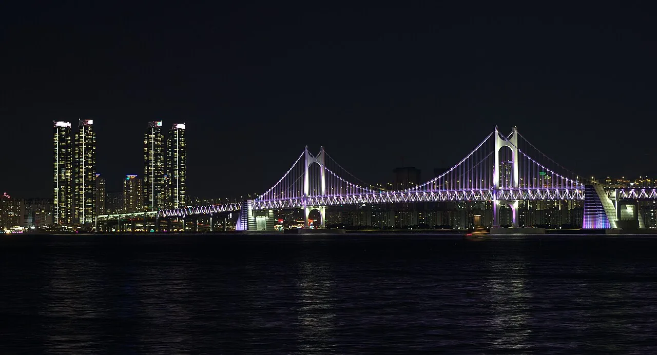 Gwangan Bridge illuminated at night seen from Marine City, Busan