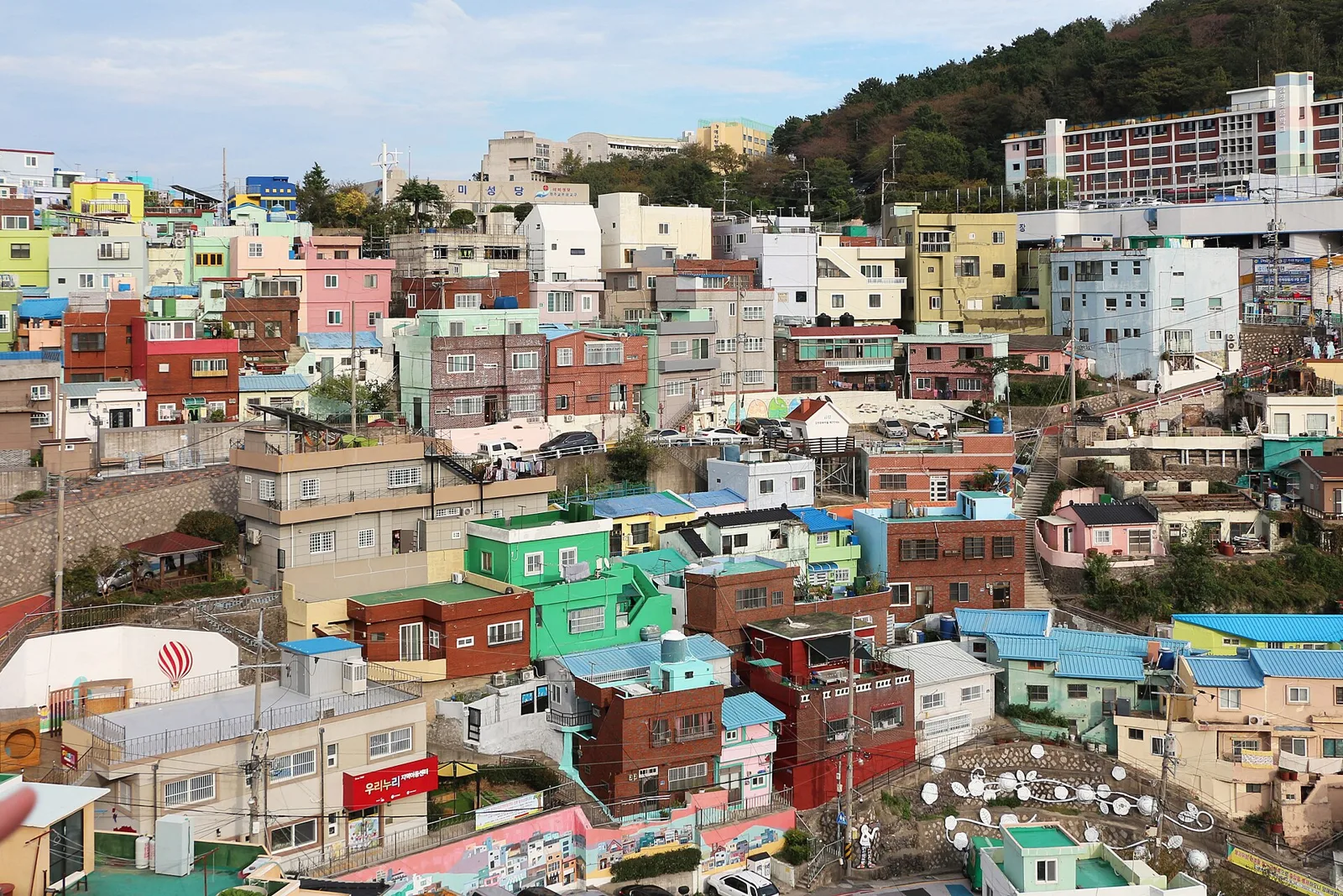 Colorful houses stacked up the hillside of Gamcheon Culture Village in Busan