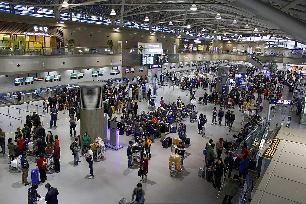 The busy departure hall of Gimhae International Airport in Busan