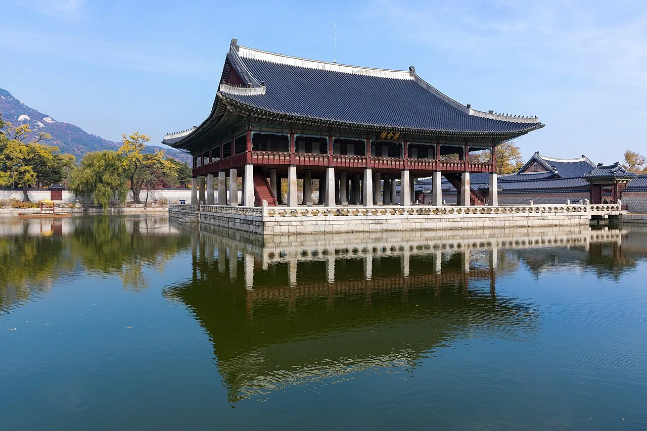 Gyeonghoeru Royal Banquet Hall reflected in its lotus pond at Gyeongbokgung Palace