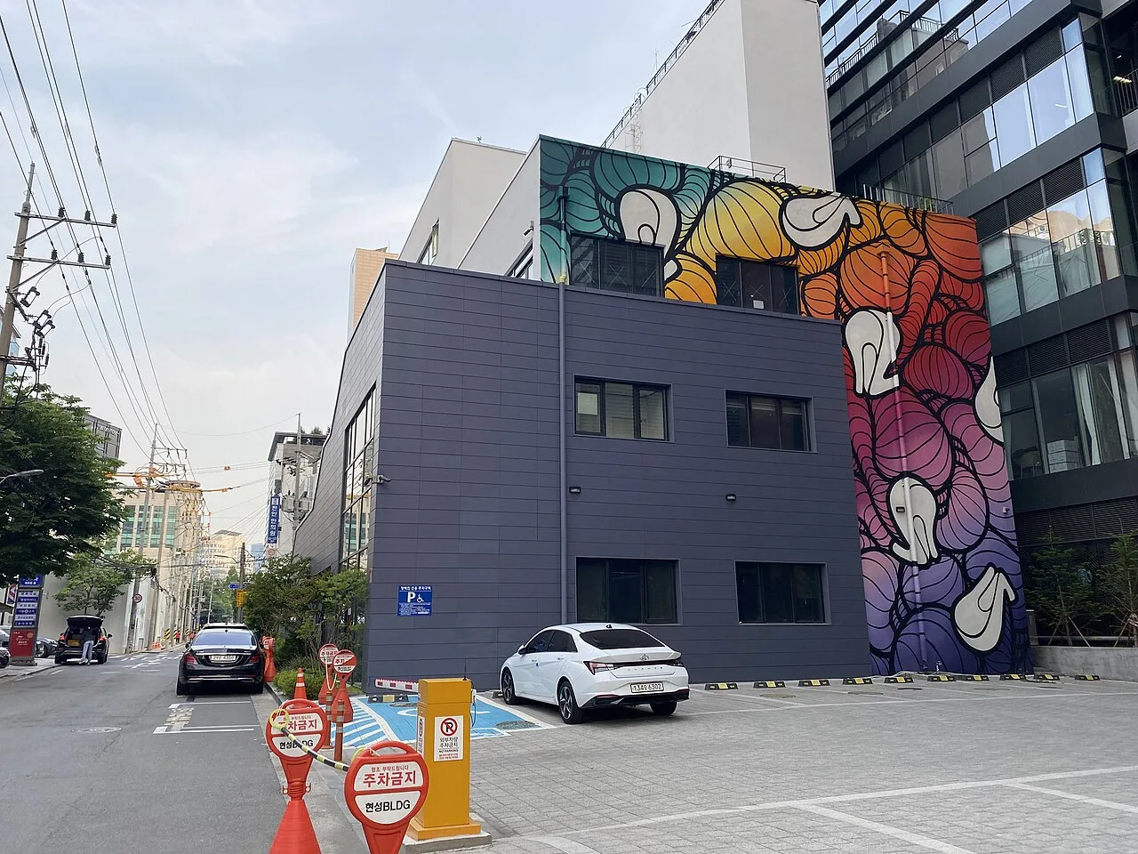 Colourful graffiti mural on a building wall in Seongsu-dong