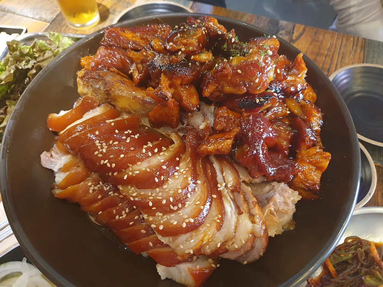 Sliced jokbal, Korean braised pork trotters, served on a plate
