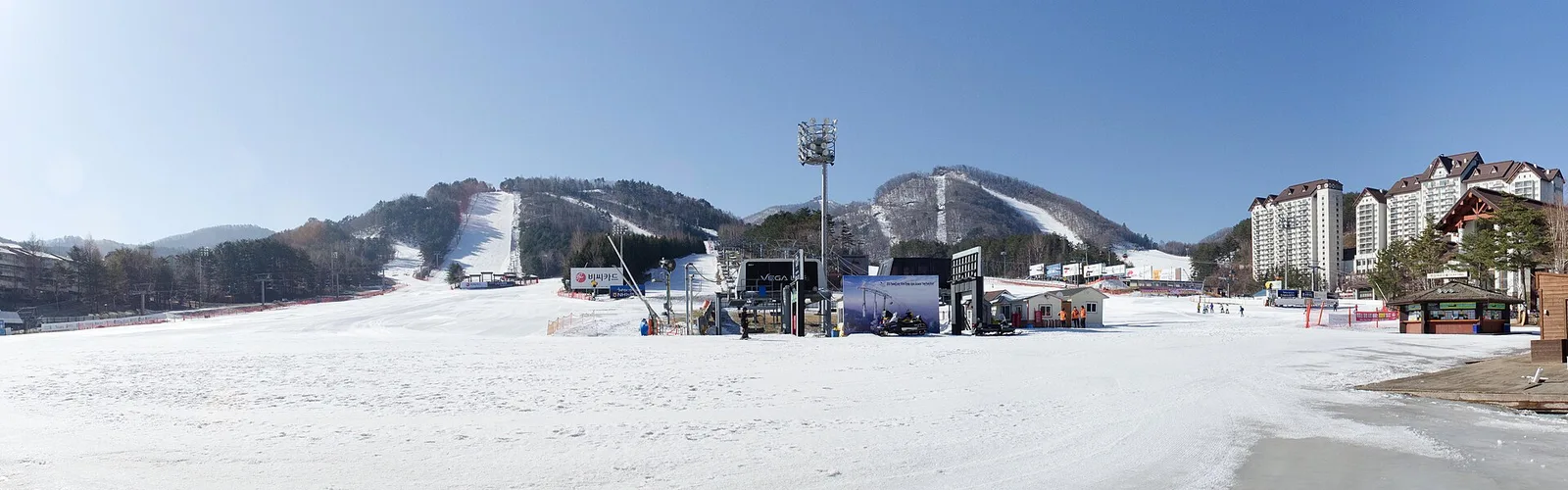 Panorama of ski runs and resort buildings at Yongpyong in March